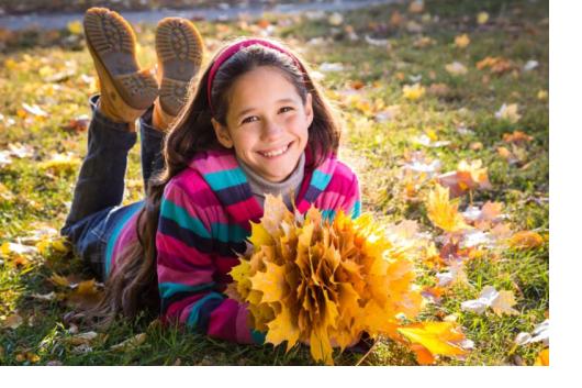 girl with autumn leaves